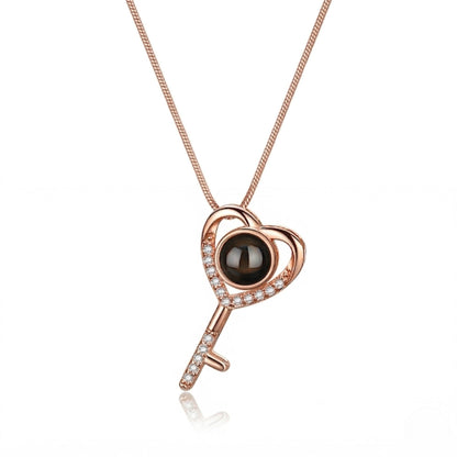 The Hidden Portrait projection key Necklace