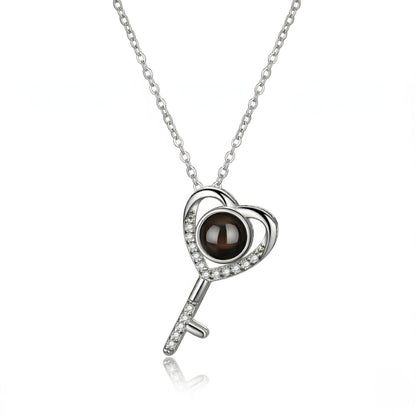 The Hidden Portrait projection key Necklace